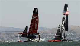 Emirates Team New Zealand sails on one hull against Oracle Team USA during Race 8 of the 34th America's Cup yacht sailing race in San Francisco